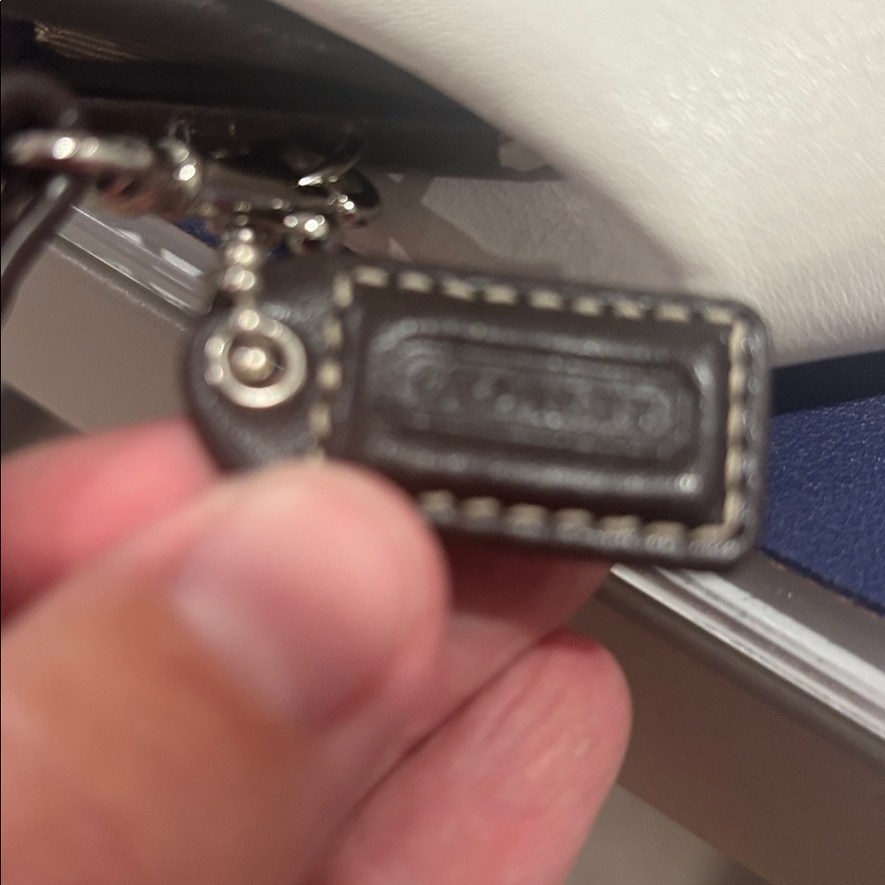 COACH WHITE LEATHER WRISTLET WITH DARK BROWN LEATHER TRIM - Picture 10 of 10